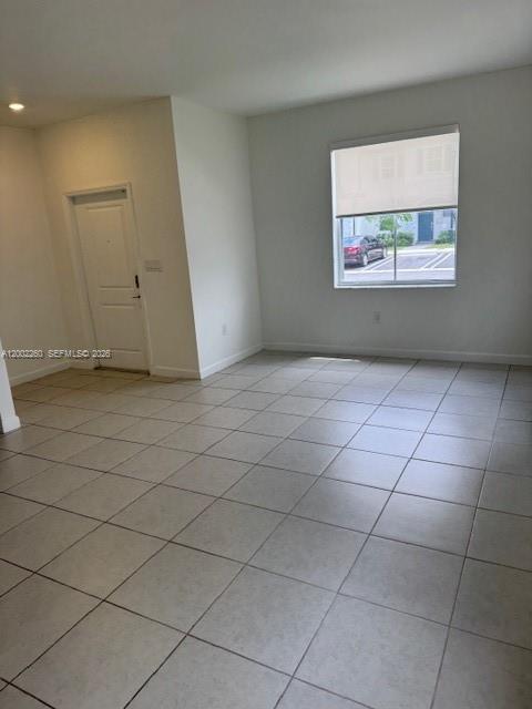 16283 Southwest 292nd Street Homestead, FL 33033 - Photo 11 of 29 an empty room with windows