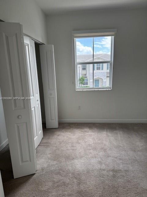 16283 Southwest 292nd Street Homestead, FL 33033 - Photo 14 of 29 an empty room with a window