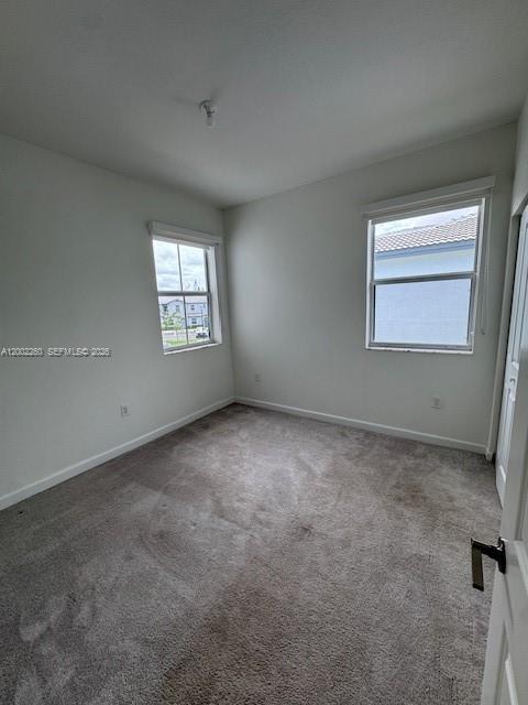 16283 Southwest 292nd Street Homestead, FL 33033 - Photo 18 of 29 an empty room with a window