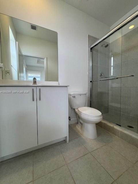 16283 Southwest 292nd Street Homestead, FL 33033 - Photo 21 of 29 a bathroom with a toilet a sink and shower