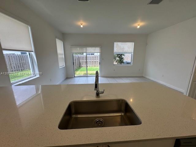 16283 Southwest 292nd Street Homestead, FL 33033 - Photo 25 of 29 a sink sitting next to a window