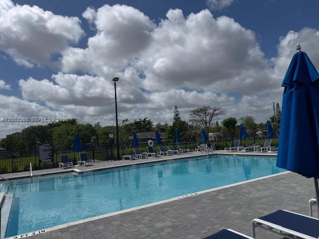 16283 Southwest 292nd Street Homestead, FL 33033 - Photo 28 of 29 a view of a lake with a city