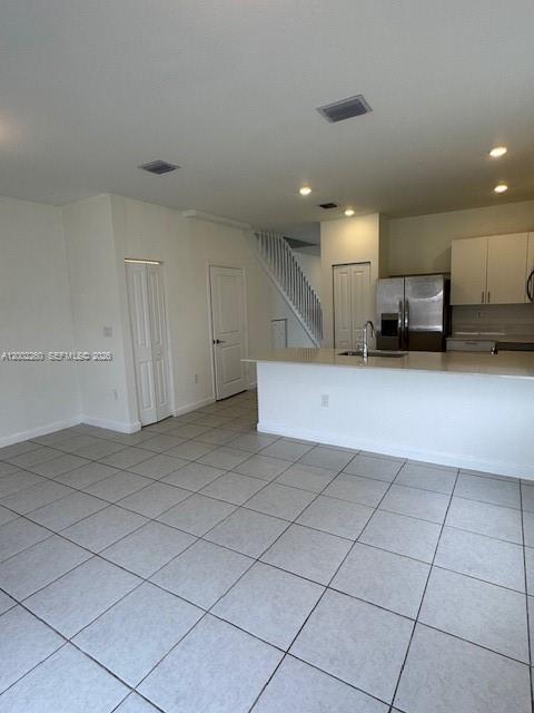 16283 Southwest 292nd Street Homestead, FL 33033 - Photo 7 of 29 a view of a kitchen with a sink and cabinets