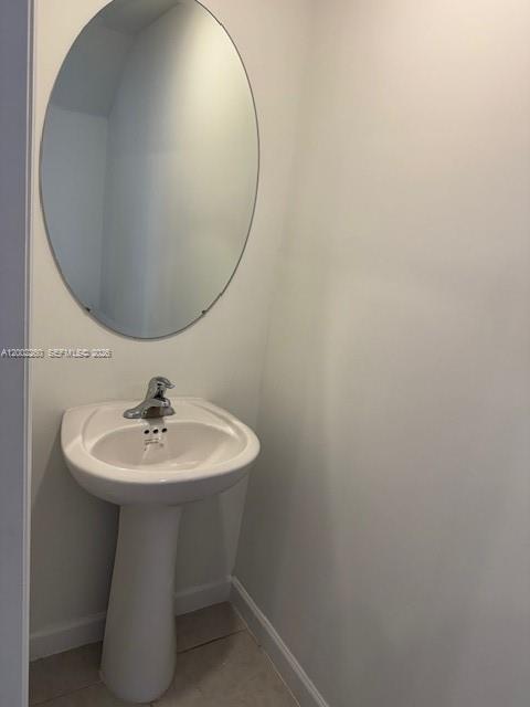 16283 Southwest 292nd Street Homestead, FL 33033 - Photo 8 of 29 a bathroom with a sink and a mirror