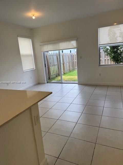 16283 Southwest 292nd Street Homestead, FL 33033 - Photo 9 of 29 a view of a kitchen with furniture and a window