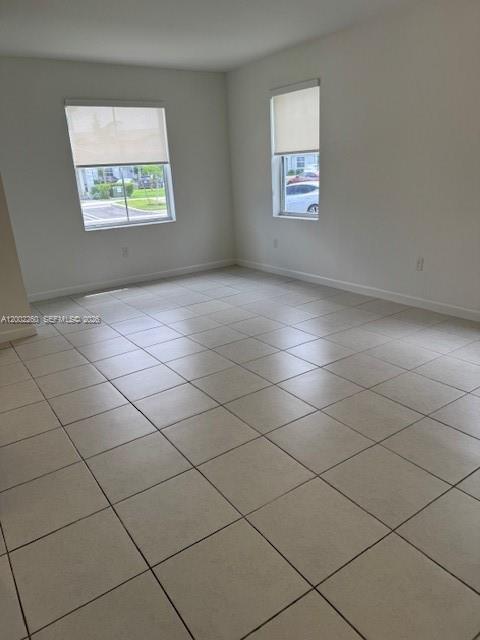 16283 Southwest 292nd Street Homestead, FL 33033 - Photo 10 of 29 a view of an empty room and a window