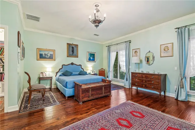 a bathroom with a granite countertop sink mirror and shower