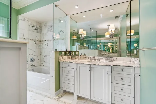 a bathroom with a granite countertop sink mirror and double
