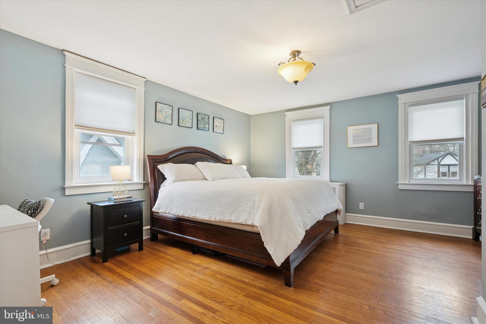 28 Chatham Road Ardmore, PA 19003 - Photo 16 of 32 a bedroom with a bed wall painting and window