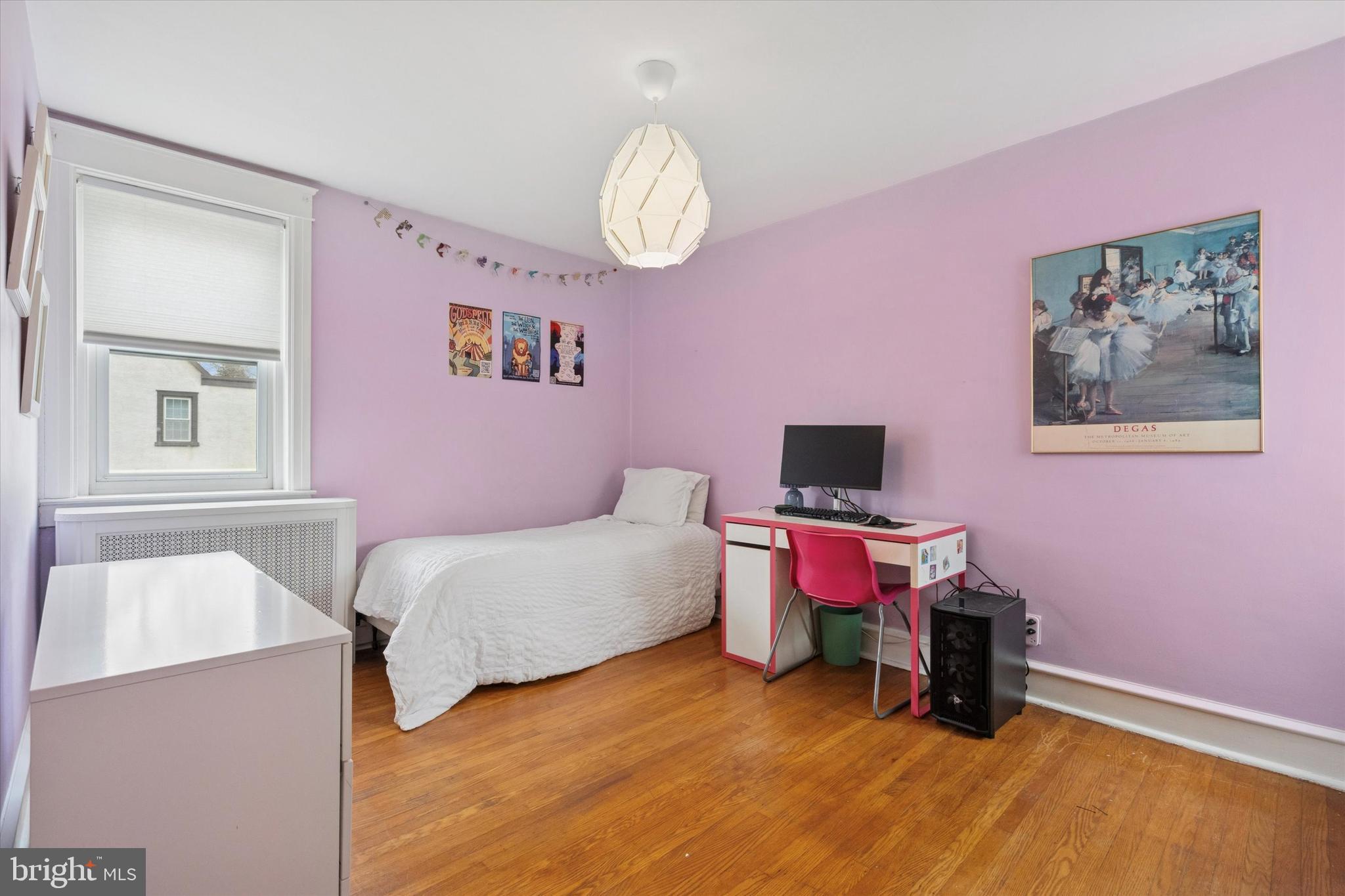 28 Chatham Road Ardmore, PA 19003 - Photo 20 of 32 a bedroom with a bed and a chair