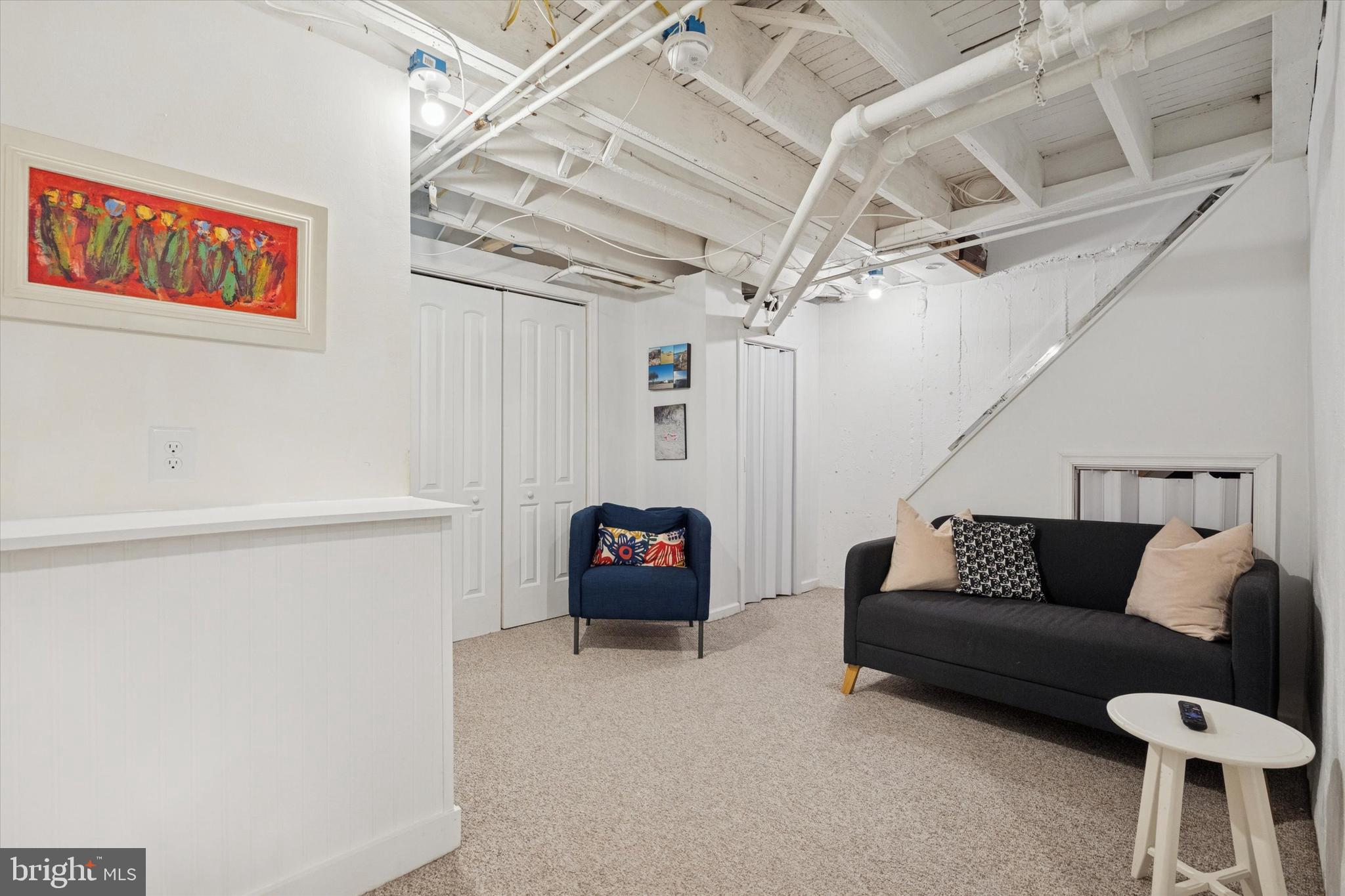 28 Chatham Road Ardmore, PA 19003 - Photo 26 of 32 a living room with furniture and a rug