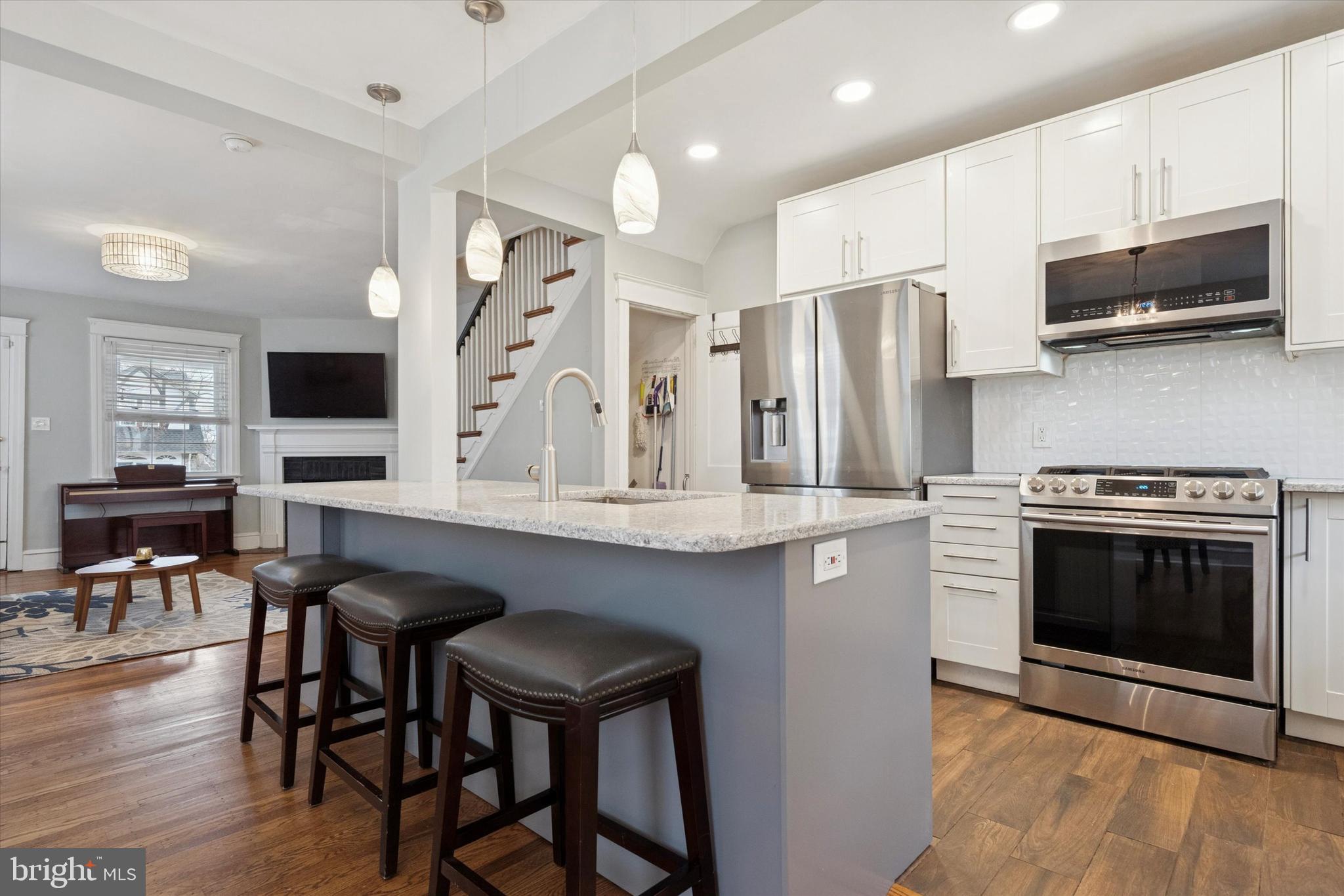 28 Chatham Road Ardmore, PA 19003 - Photo 8 of 32 a kitchen with stainless steel appliances a stove microwave and refrigerator