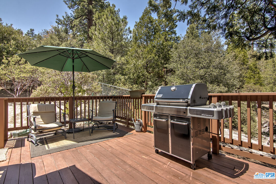 25527 Cedar Glen Drive Idyllwild, CA 92549 - Photo 16 of 69 a view of a balcony with chairs