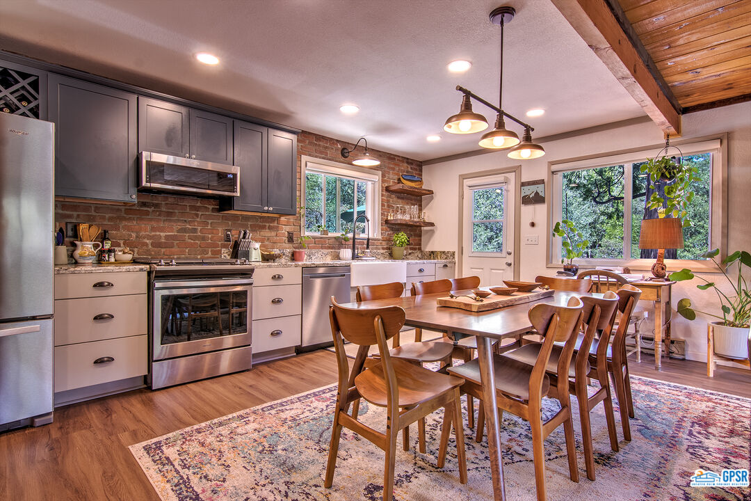 25527 Cedar Glen Drive Idyllwild, CA 92549 - Photo 2 of 69 a view of a dining room with furniture window and outside view