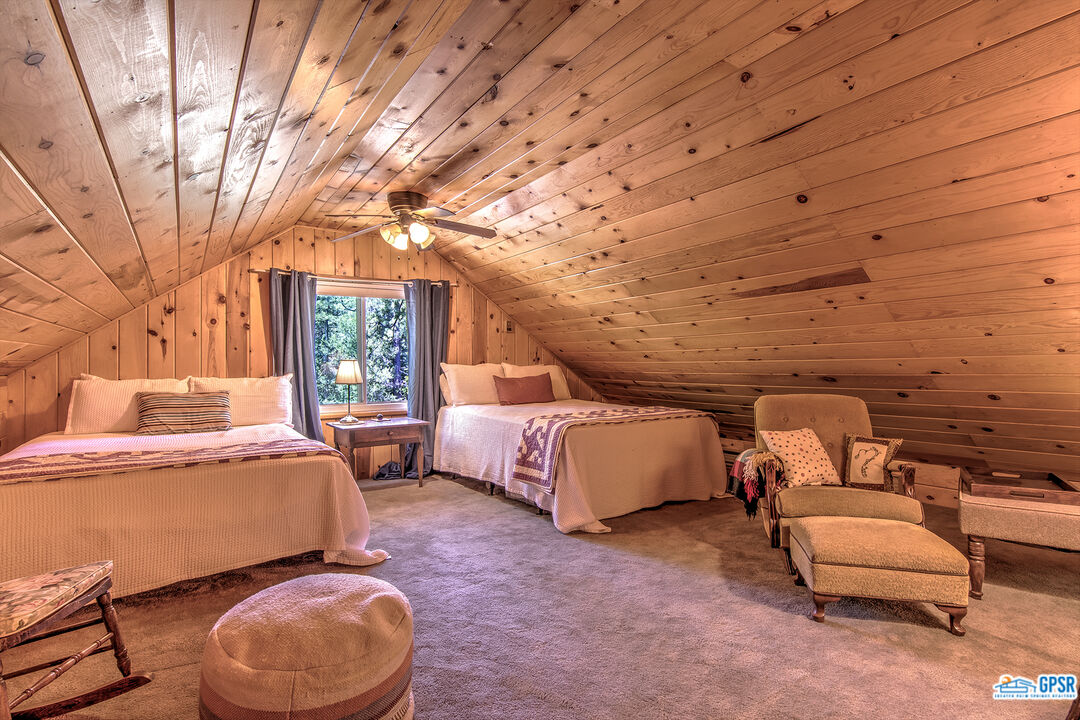 25527 Cedar Glen Drive Idyllwild, CA 92549 - Photo 24 of 69 a bedroom with bed and window