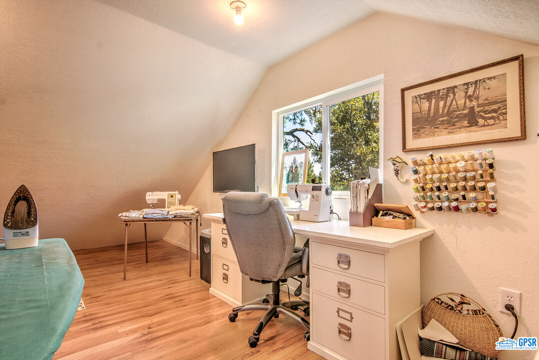 25527 Cedar Glen Drive Idyllwild, CA 92549 - Photo 27 of 69 a view of a workspace with furniture and a window