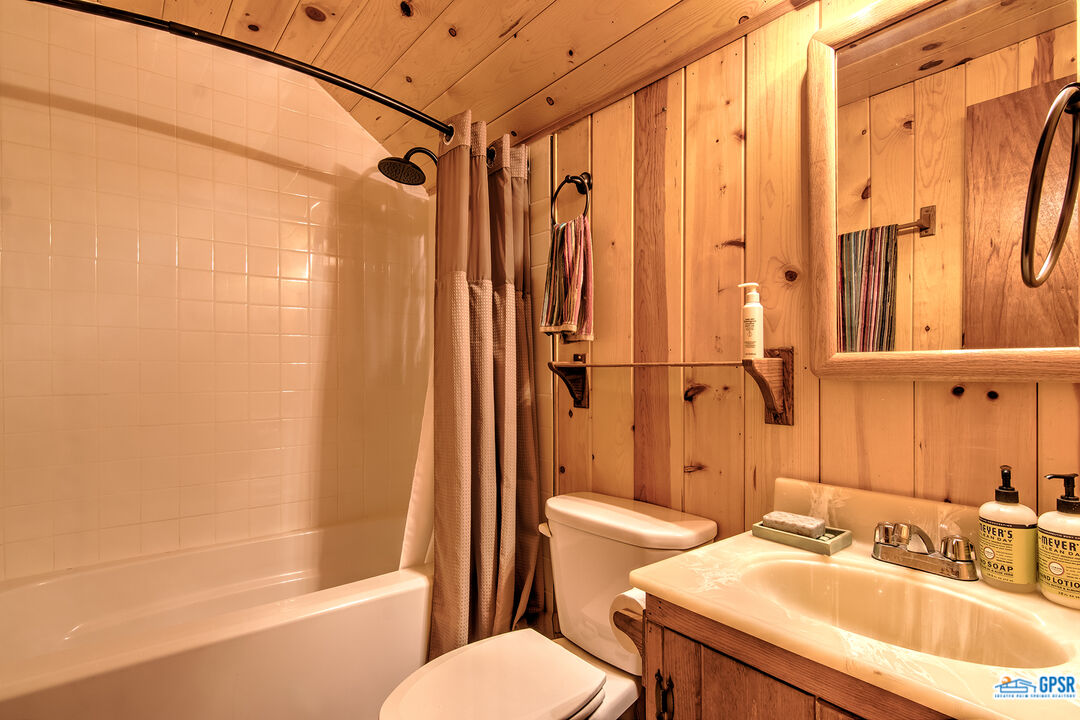 25527 Cedar Glen Drive Idyllwild, CA 92549 - Photo 28 of 69 a bathroom with a sink toilet and shower