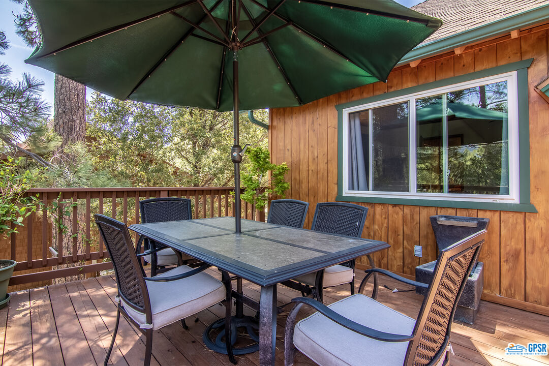 25527 Cedar Glen Drive Idyllwild, CA 92549 - Photo 43 of 69 a view of a chairs and table in the roof deck