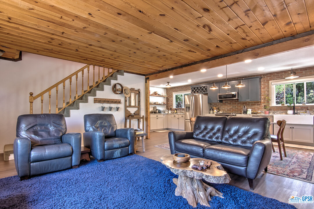 25527 Cedar Glen Drive Idyllwild, CA 92549 - Photo 50 of 69 a living room with furniture and wooden floors