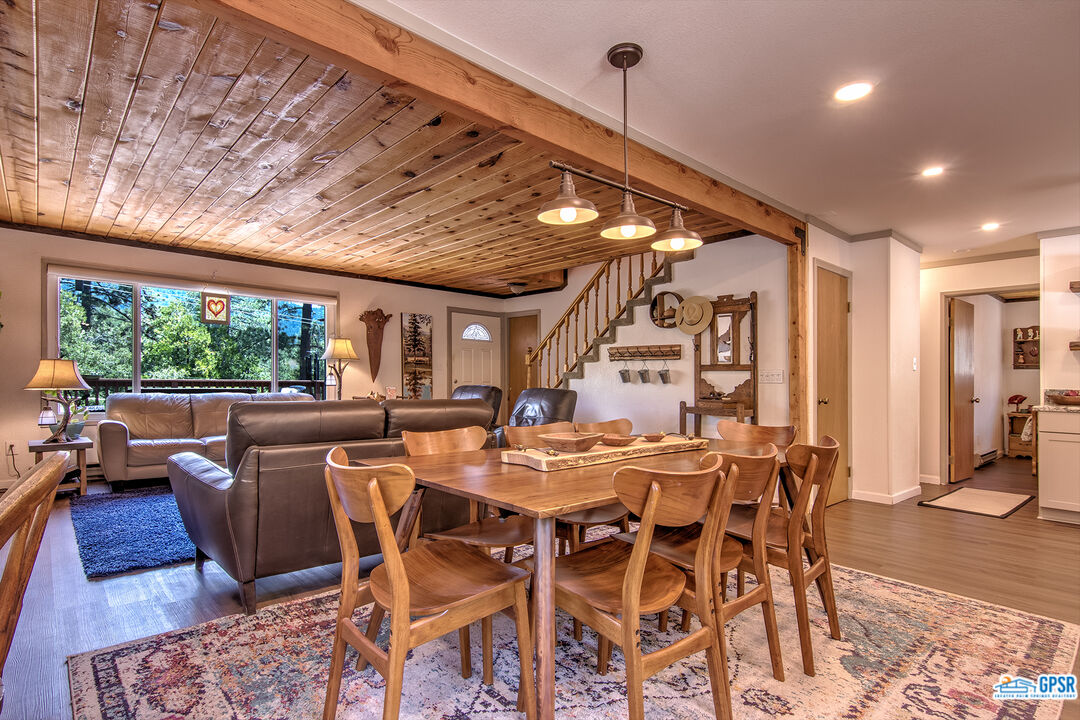 25527 Cedar Glen Drive Idyllwild, CA 92549 - Photo 52 of 69 a view of a dining room with furniture window and outside view