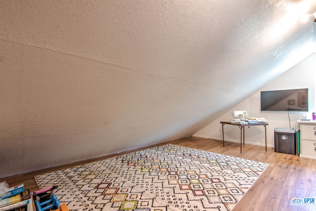 25527 Cedar Glen Drive Idyllwild, CA 92549 - Photo 64 of 69 a living room with a couch and a coffee table