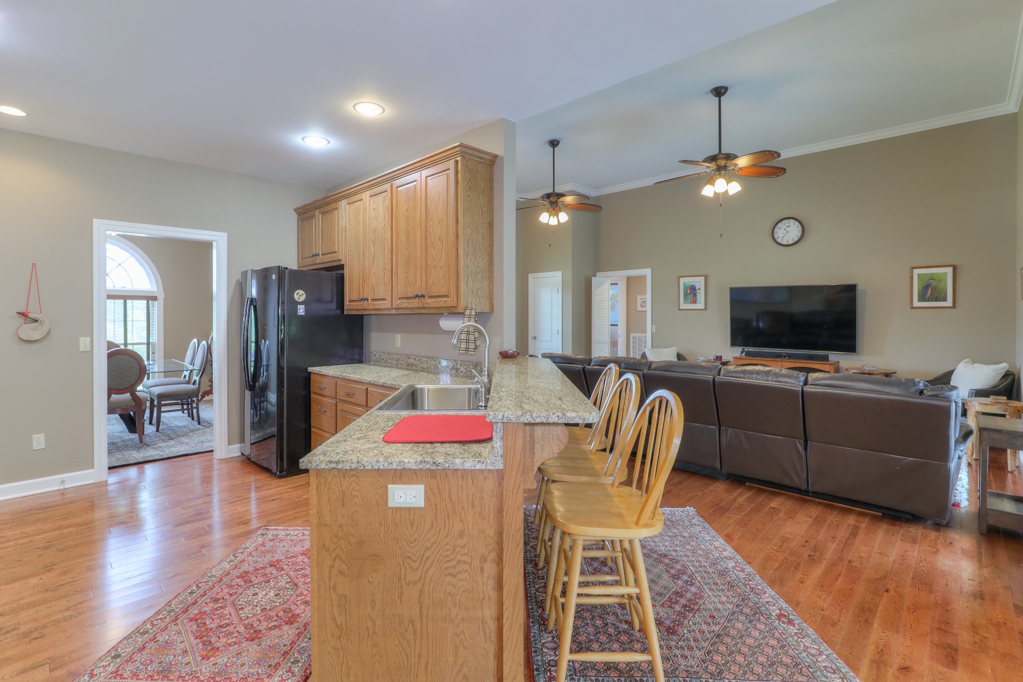 465 North Commerce Road Watertown, TN 37184 - Photo 13 of 47 a living room with furniture and a flat screen tv