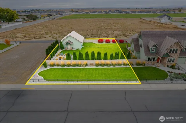 swimming pool view with a lake view