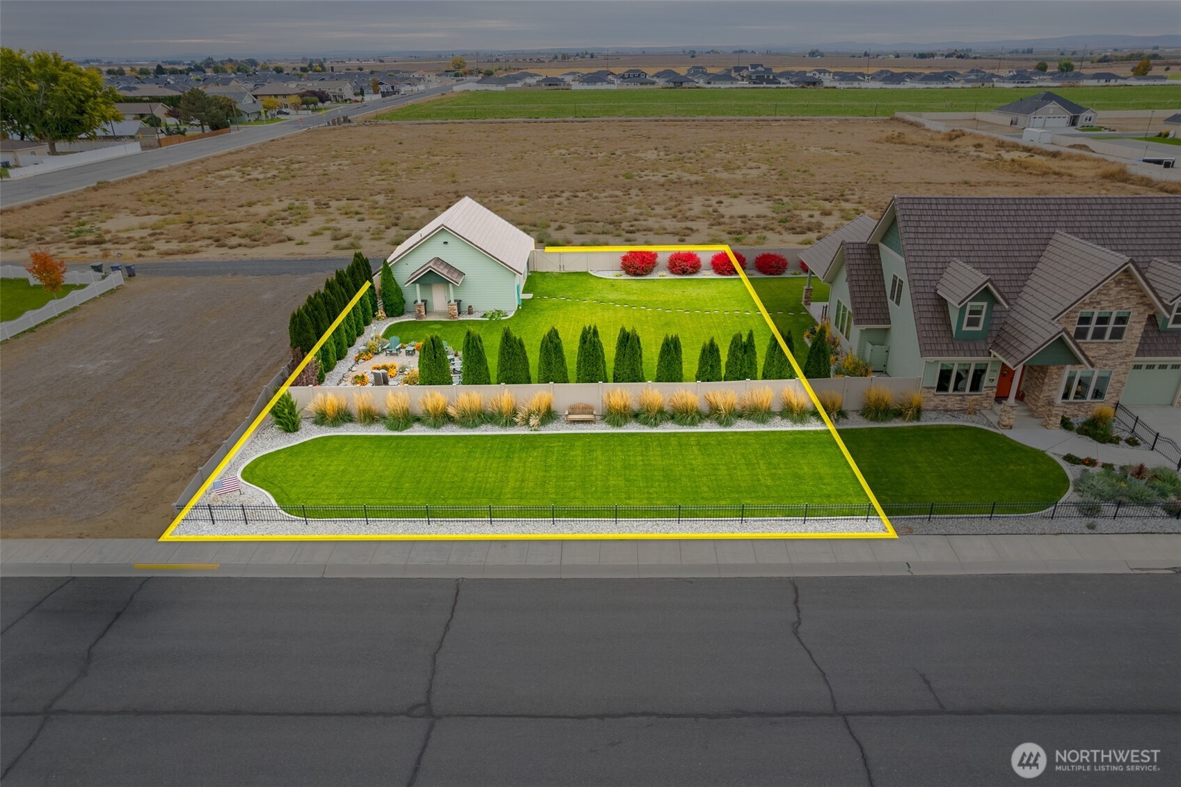 swimming pool view with a lake view