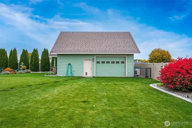 a view of a house with a garden