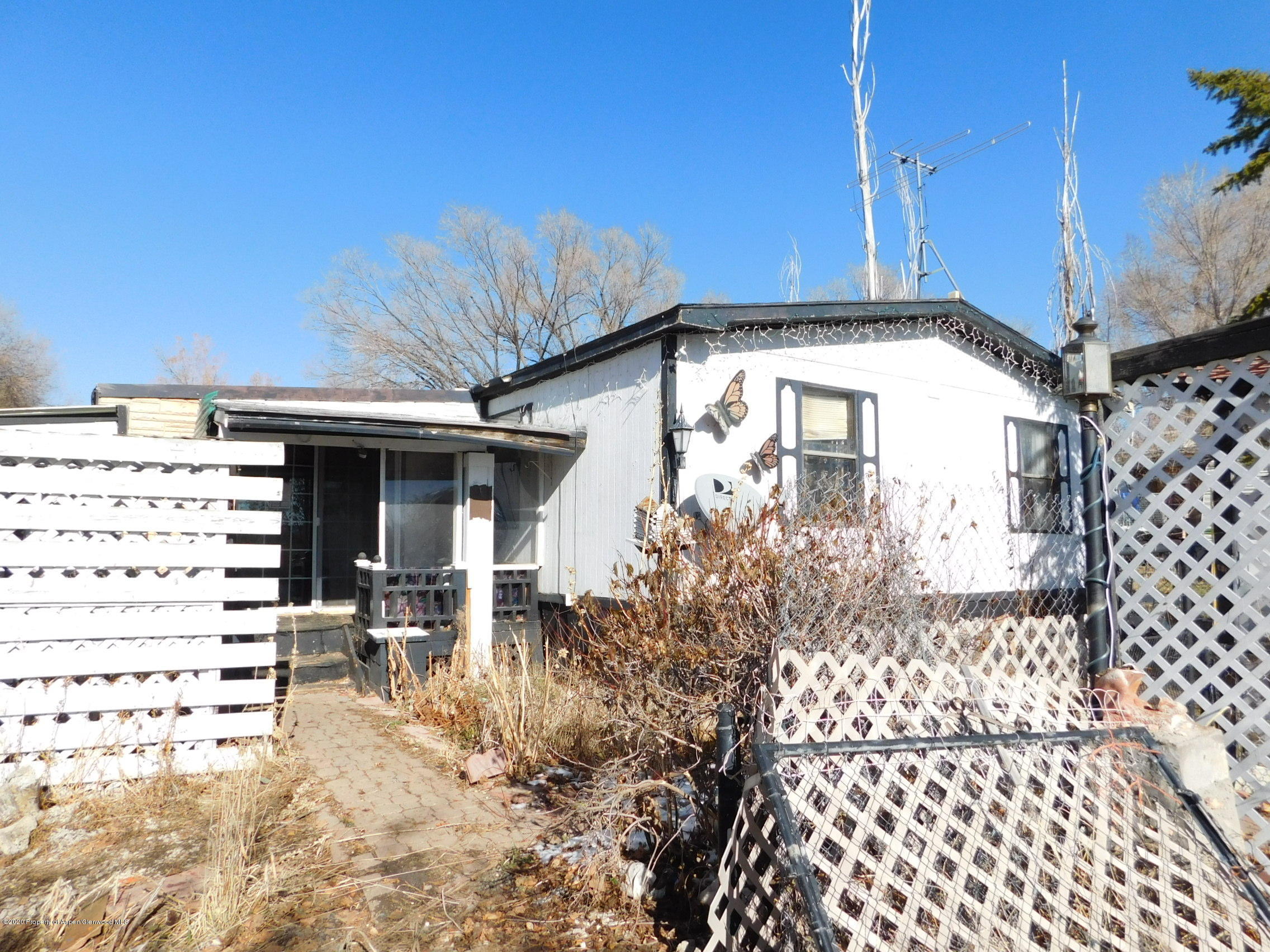 2235 Baker Drive Craig, CO 81625 - Photo 4 of 16 a view of a chairs and table in the patio