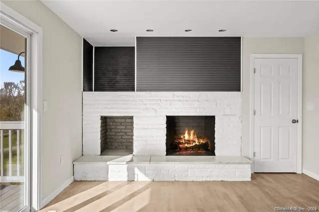 a living room with a fireplace