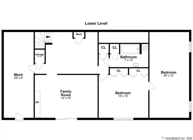 a view of a backyard with plants and large trees