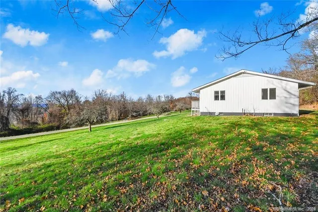 front view of house with a yard