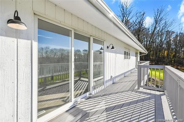 a view of a balcony with a potted plants