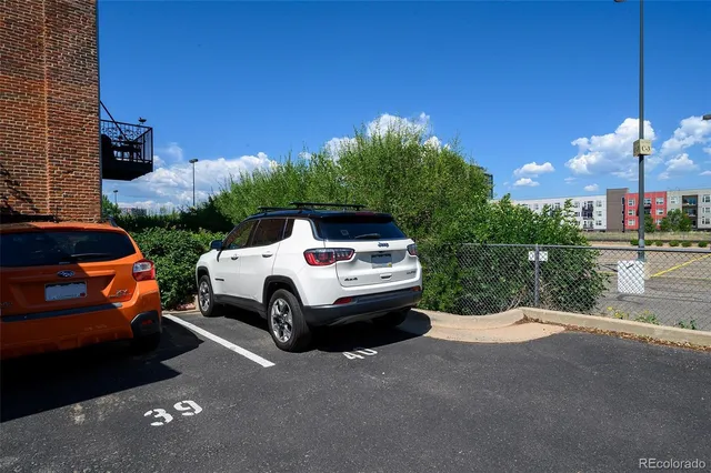 a car parked in front of a building
