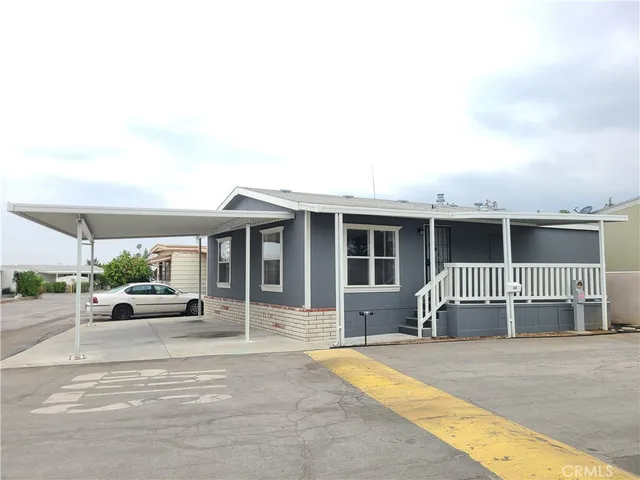 a front view of a house with a porch