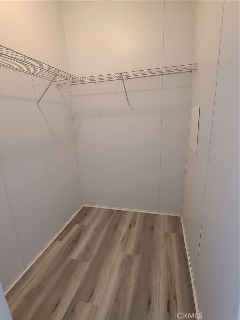 840 East Foothill Boulevard, Unit 64 Azusa, CA 91702 - Photo 18 of 25 a view of a room with racks on the wall