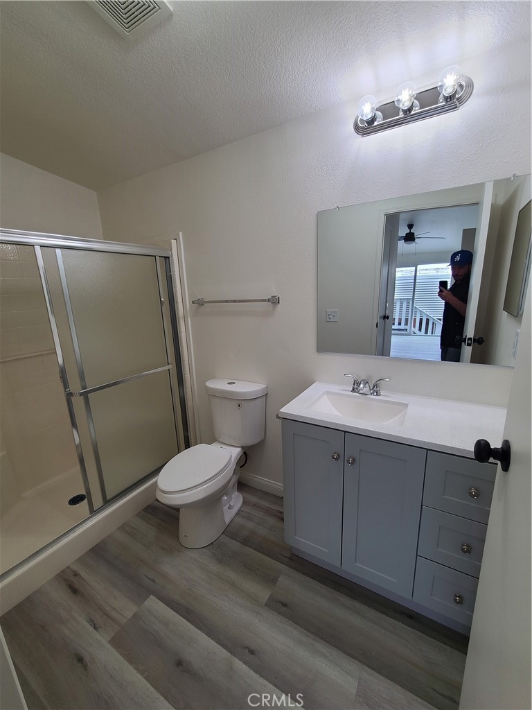 840 East Foothill Boulevard, Unit 64 Azusa, CA 91702 - Photo 21 of 25 a bathroom with a sink toilet and shower