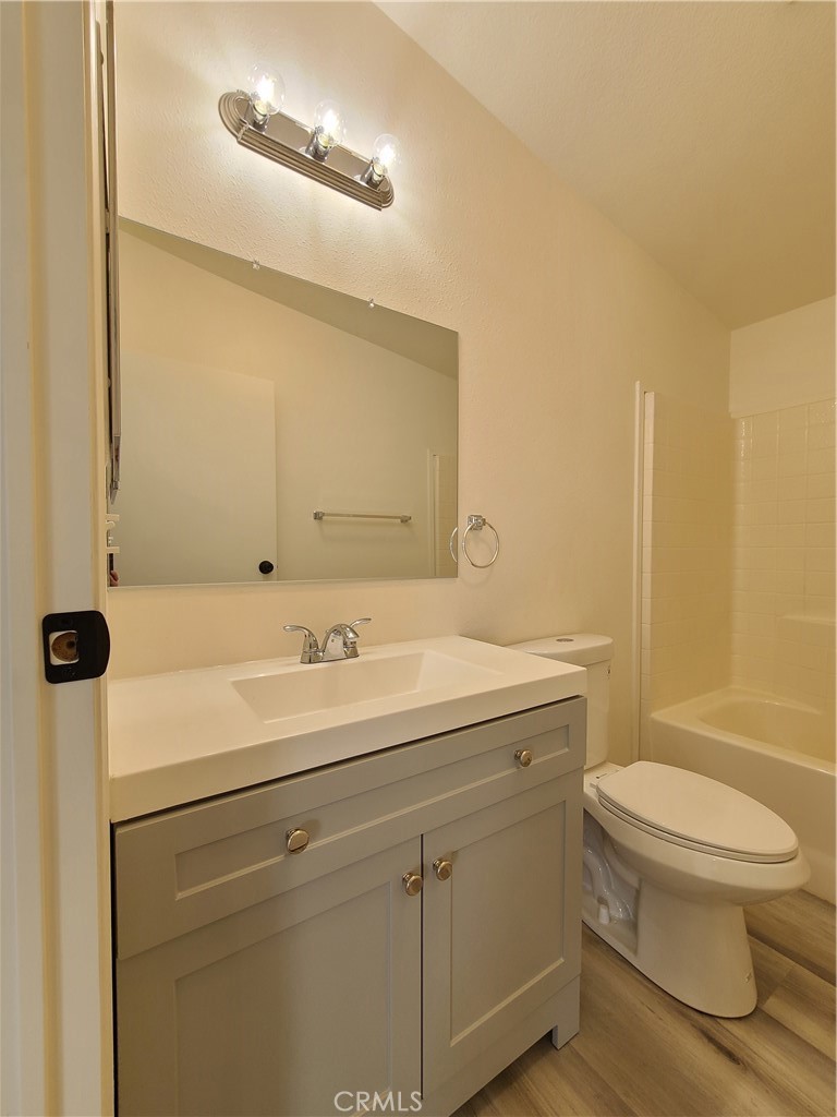 840 East Foothill Boulevard, Unit 64 Azusa, CA 91702 - Photo 23 of 25 a bathroom with a sink a toilet and shower