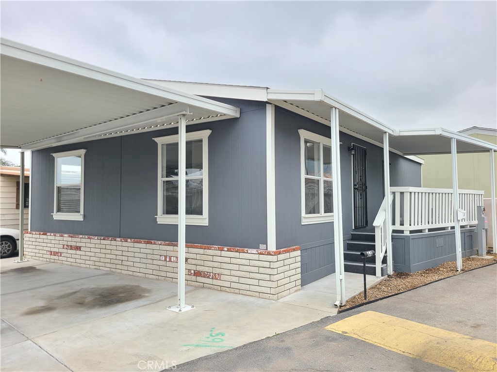 840 East Foothill Boulevard, Unit 64 Azusa, CA 91702 - Photo 3 of 25 a front view of a house