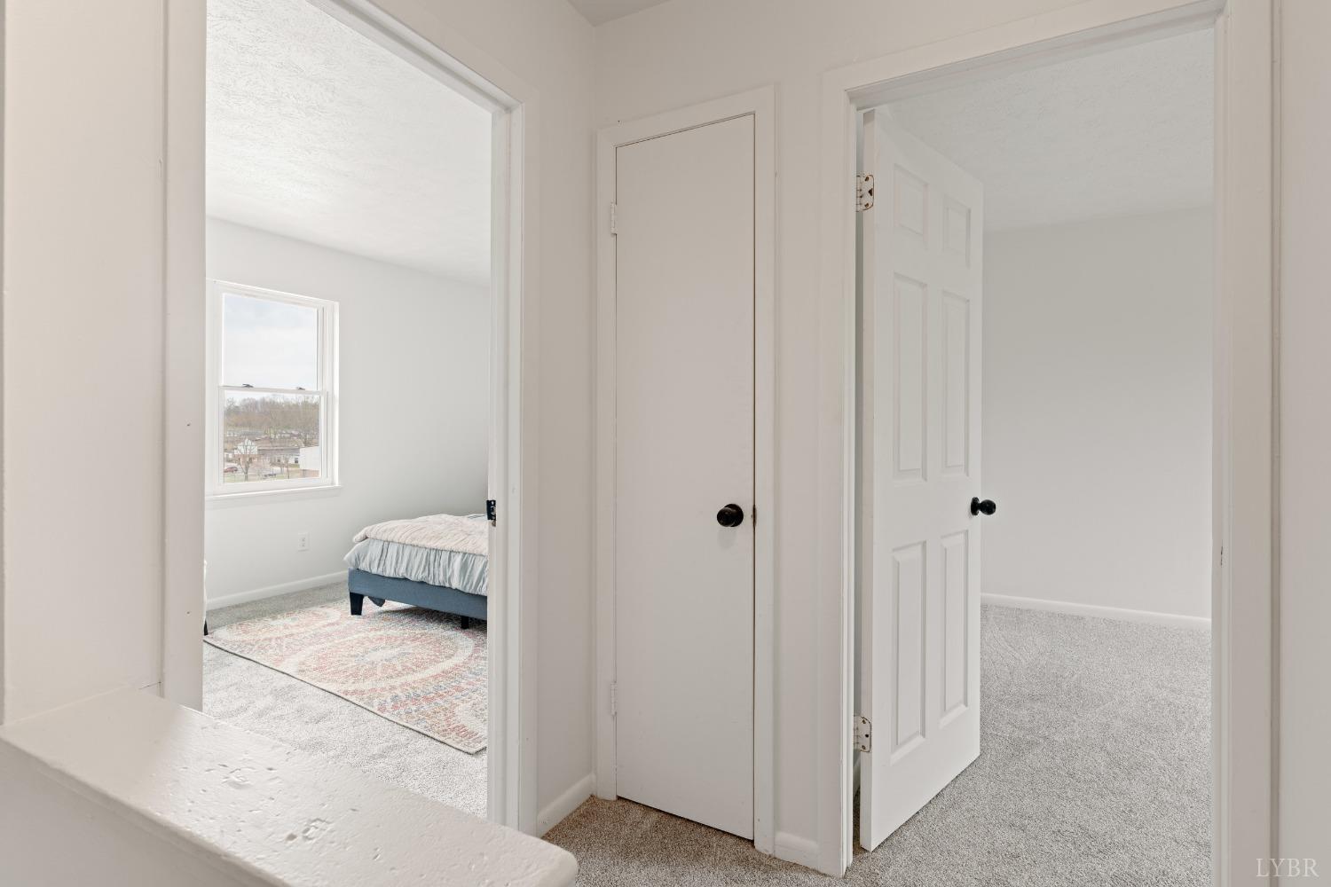 178 Dulwich Drive, Unit 182 Amherst, VA 24521 - Photo 12 of 23 a view of a bedroom with wooden floor and furniture