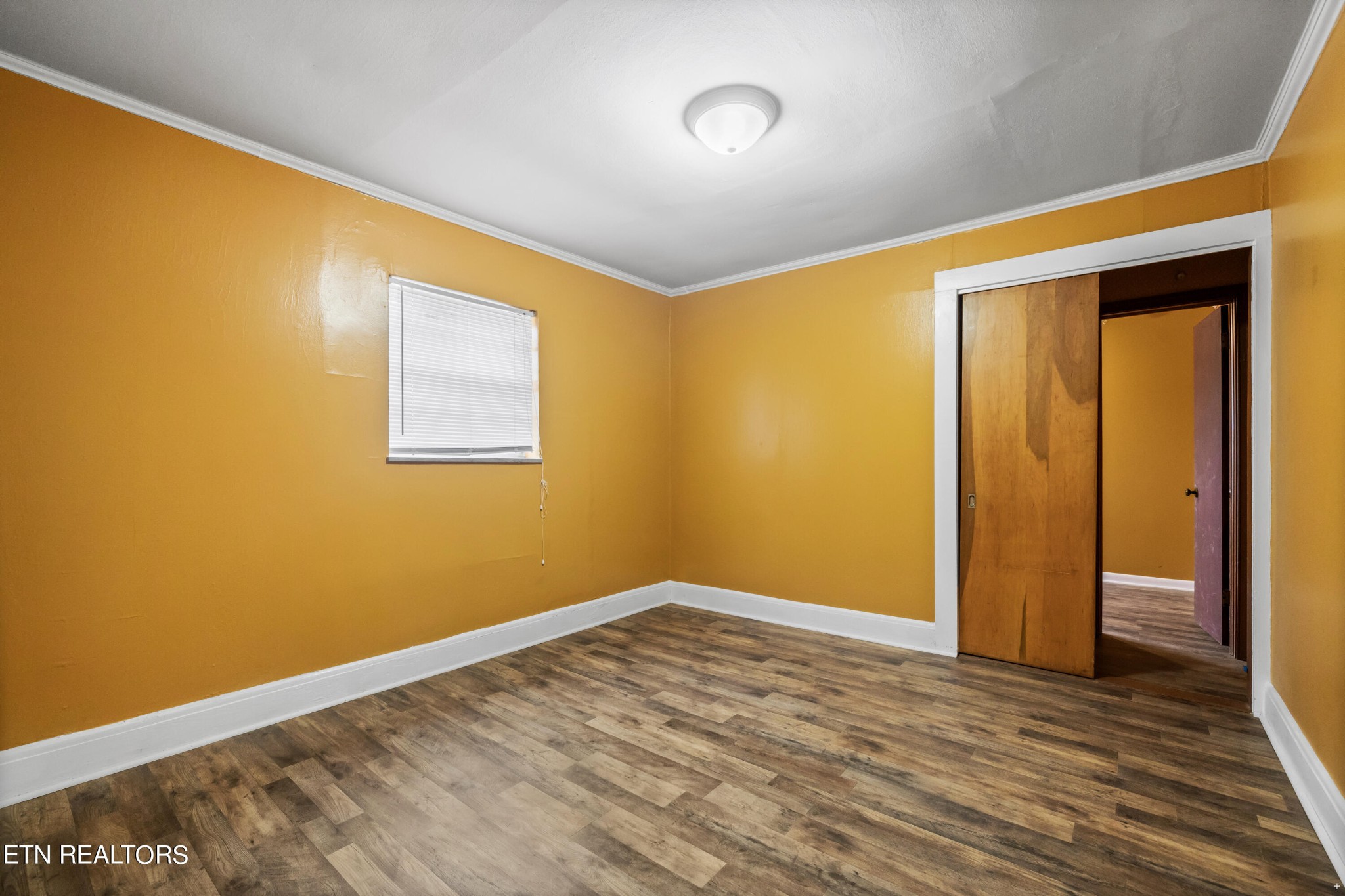 738 South Jackson Street Athens, TN 37303 - Photo 20 of 25 a view of empty room with wooden floor
