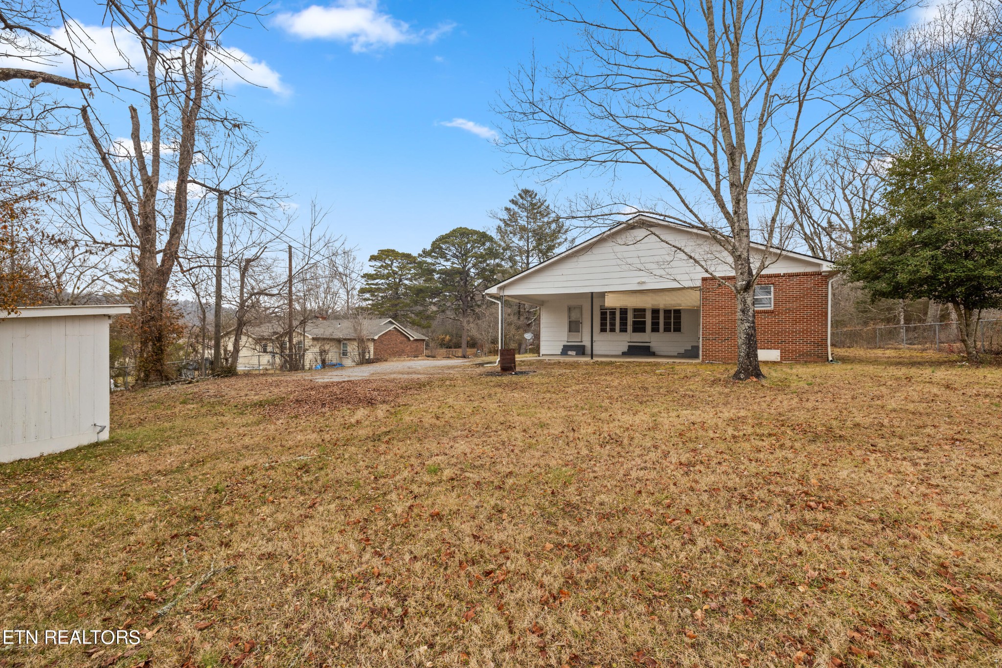 738 South Jackson Street Athens, TN 37303 - Photo 23 of 25 a front view of a house with a yard