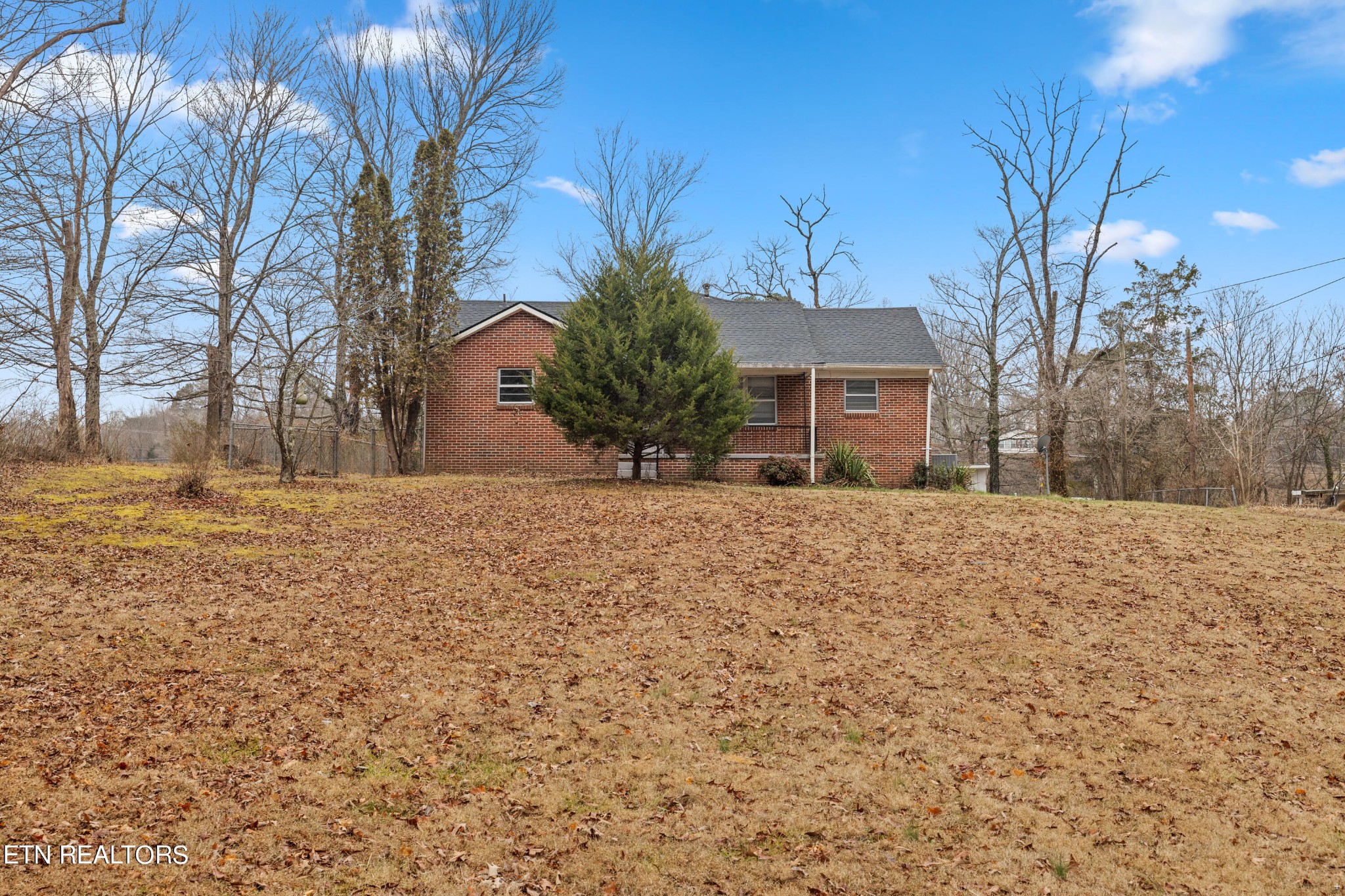 738 South Jackson Street Athens, TN 37303 - Photo 3 of 25 a front view of house with a yard