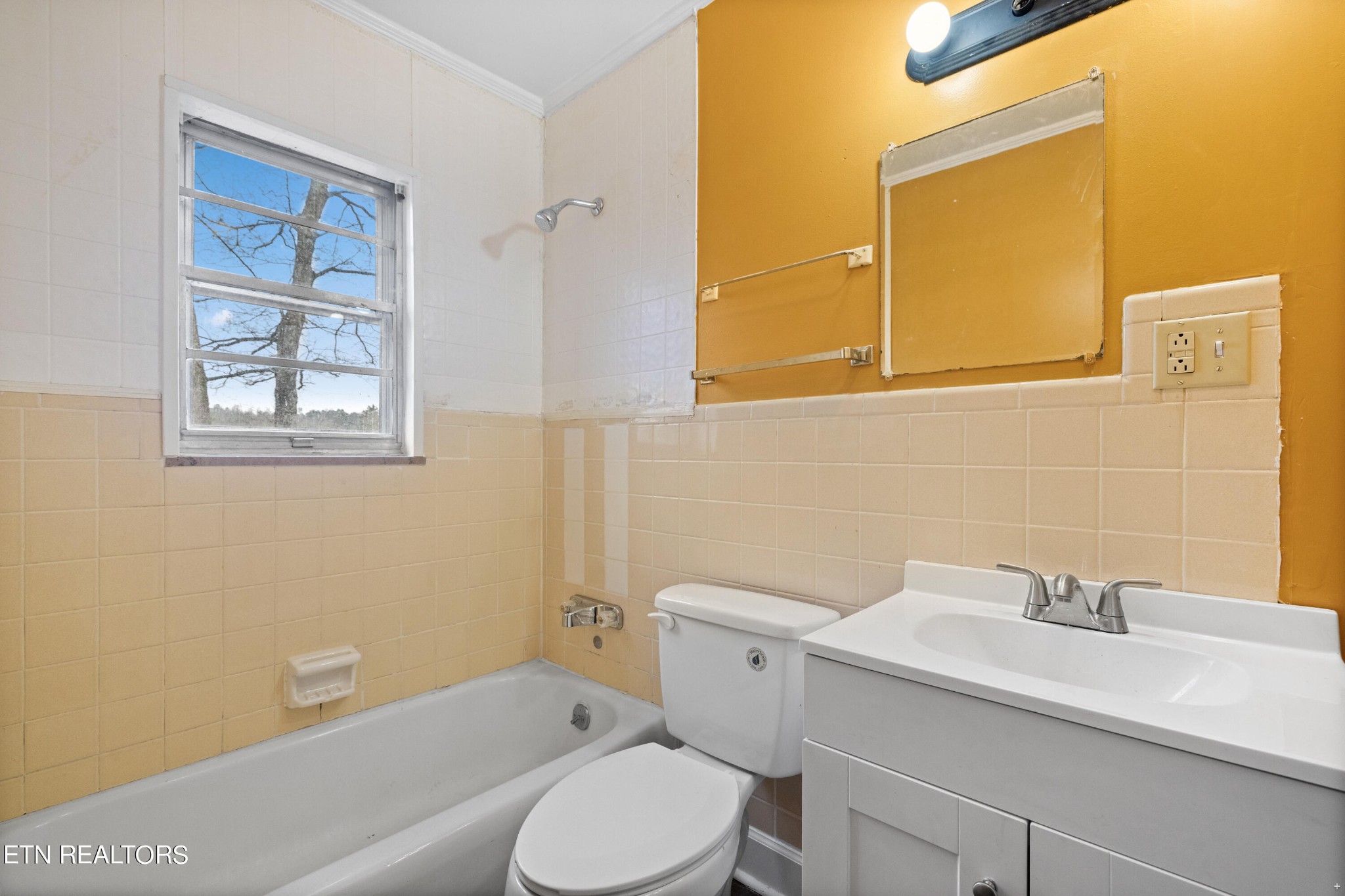 738 South Jackson Street Athens, TN 37303 - Photo 7 of 25 a bathroom with a sink toilet and a mirror