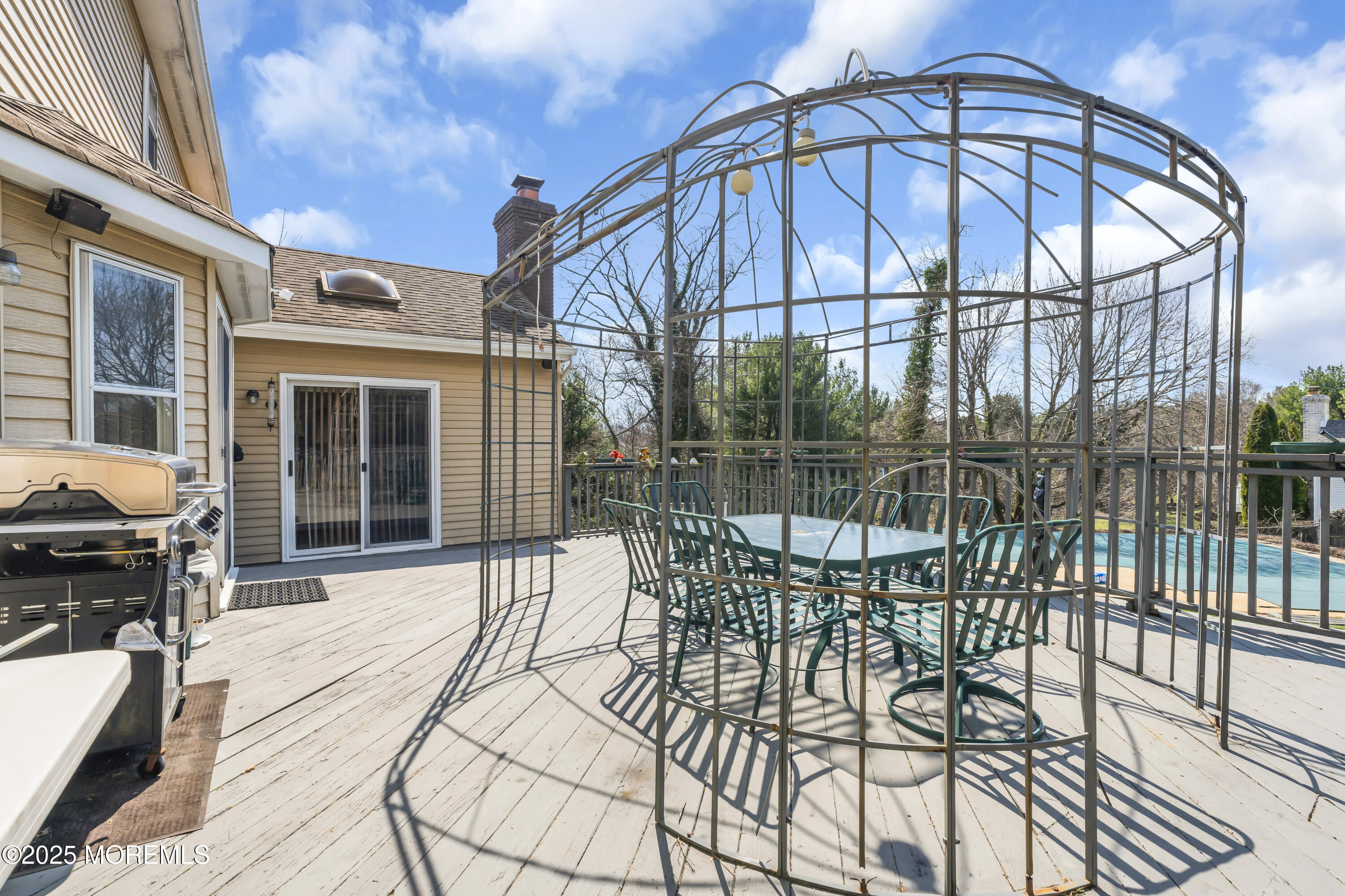 24 Laird Road Middletown, NJ 07748 - Photo 32 of 45 a view of a house with backyard and deck