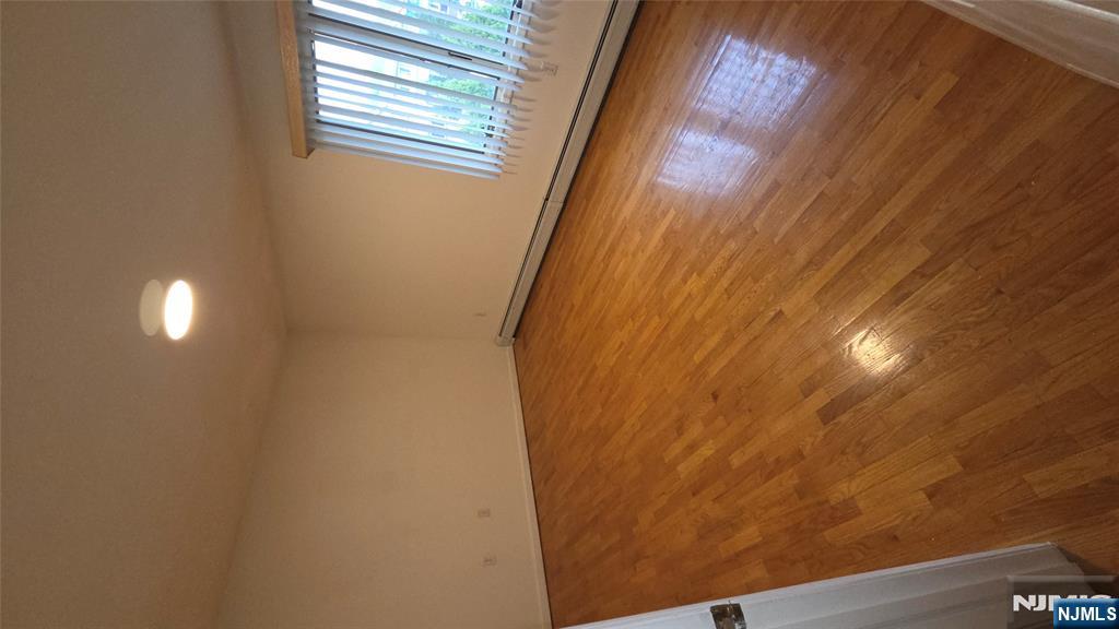 755 Edgewater Avenue, Unit 2 Ridgefield, NJ 07657 - Photo 10 of 13 a view of an empty room and window