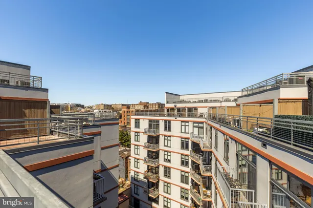 a view of a balcony with city view