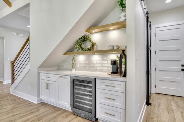 a kitchen with a stove and a refrigerator
