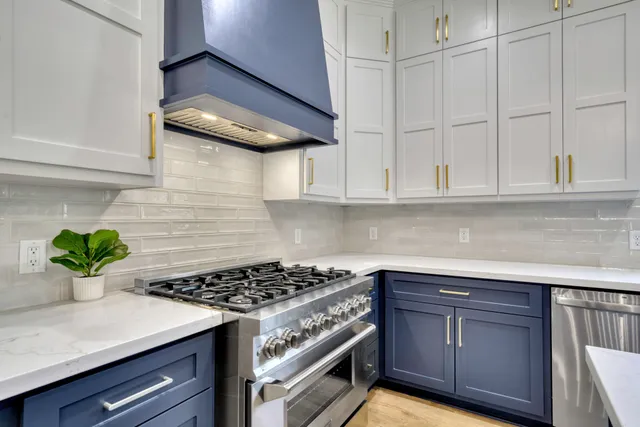 a kitchen with a cabinets and a stove